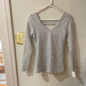 New with tag on       long sleeve V-neck top